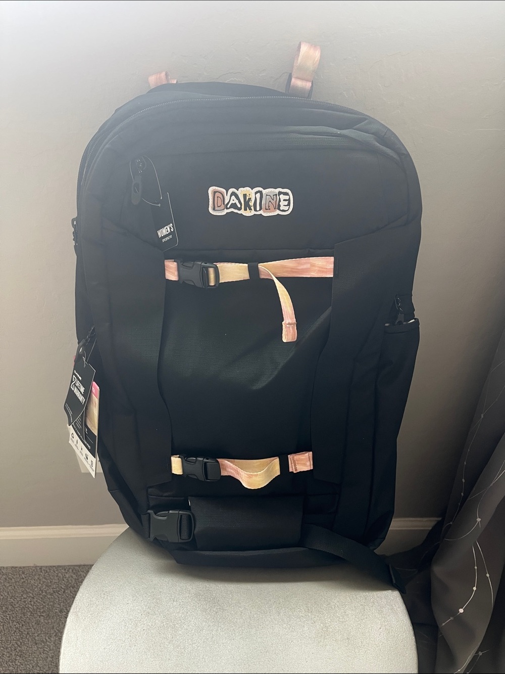 Dakine Black Backpack with Pink Accent Straps